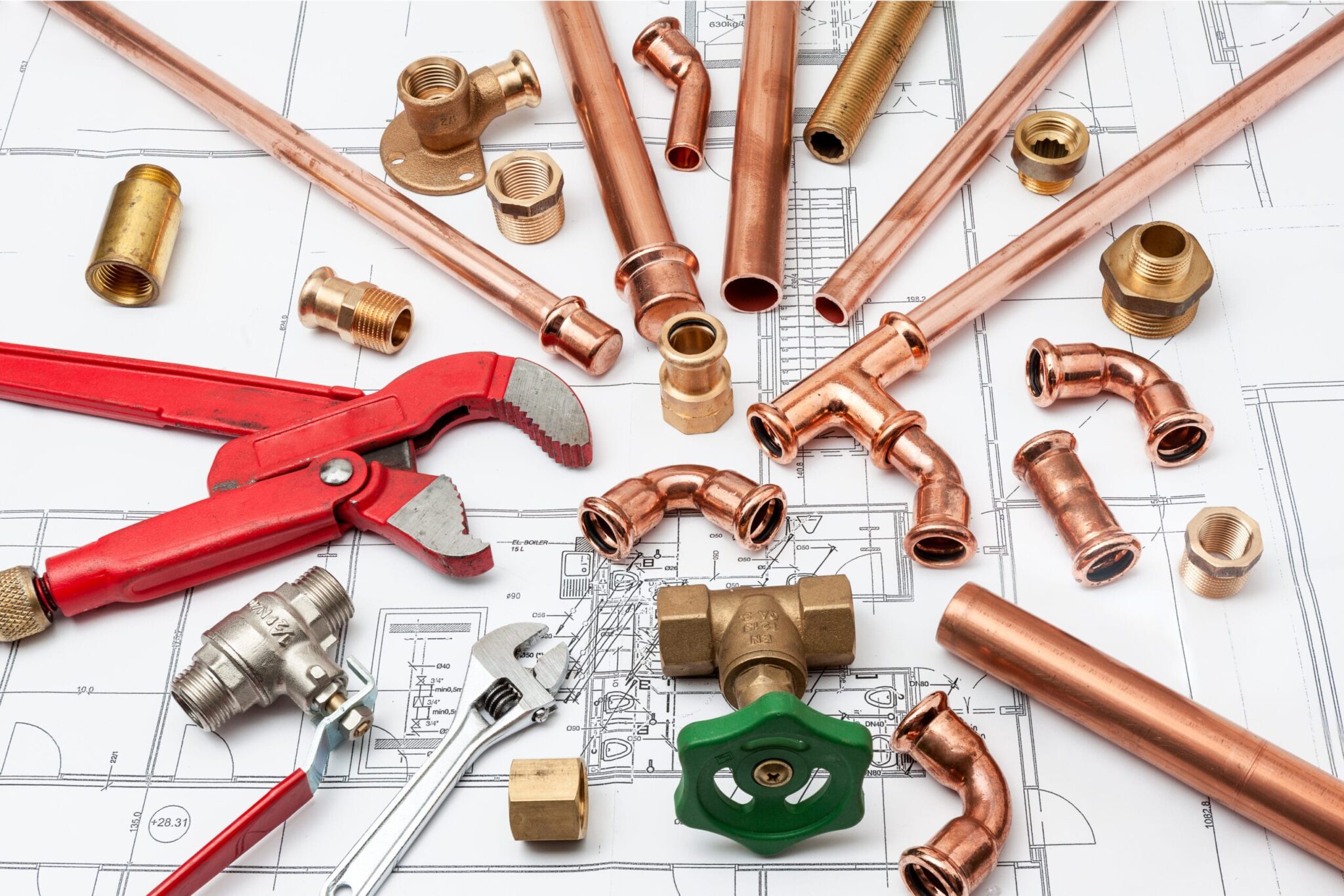 Copper pipes, fittings, valves, and plumbing tools in Auburndale
